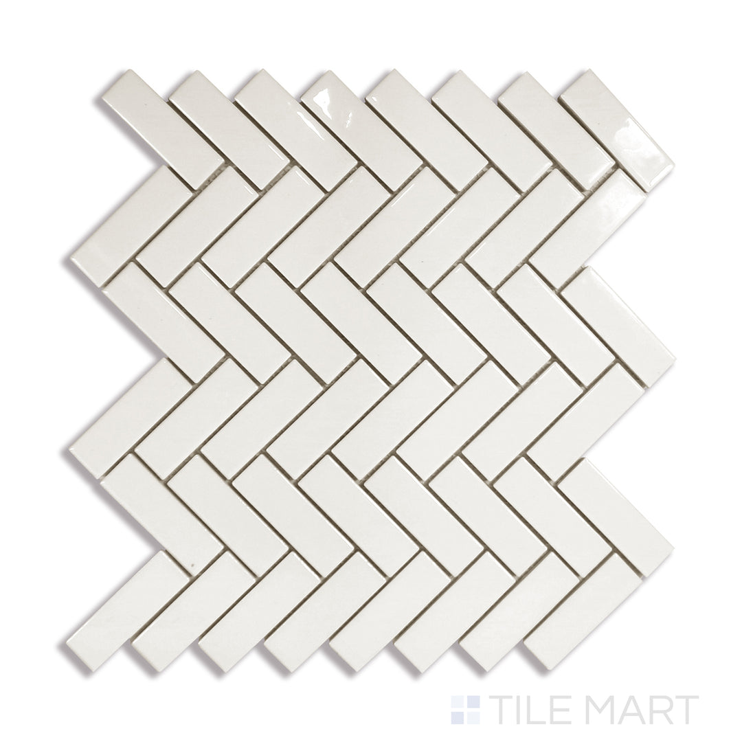 Angled shot of ALMOND GLOSSY HERRINGBONE MOSAIC PORCELAIN MOSAIC with a GLOSSY finish, providing a sharp, angled view to emphasize the product's texture and quality.