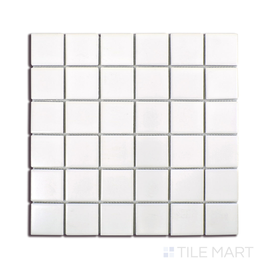 Angled shot of WHITE GLOSSY 2X2X6MM PORCELAIN MOSAIC with a GLOSSY finish, highlighting the intricate details and elegant finish from a unique perspective.