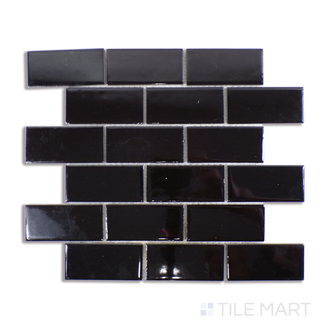 Angled shot of BLACK GLOSSY 2X4 PORCELAIN MOSAIC with a GLOSSY finish, displaying the fine craftsmanship and layered design from a different angle.