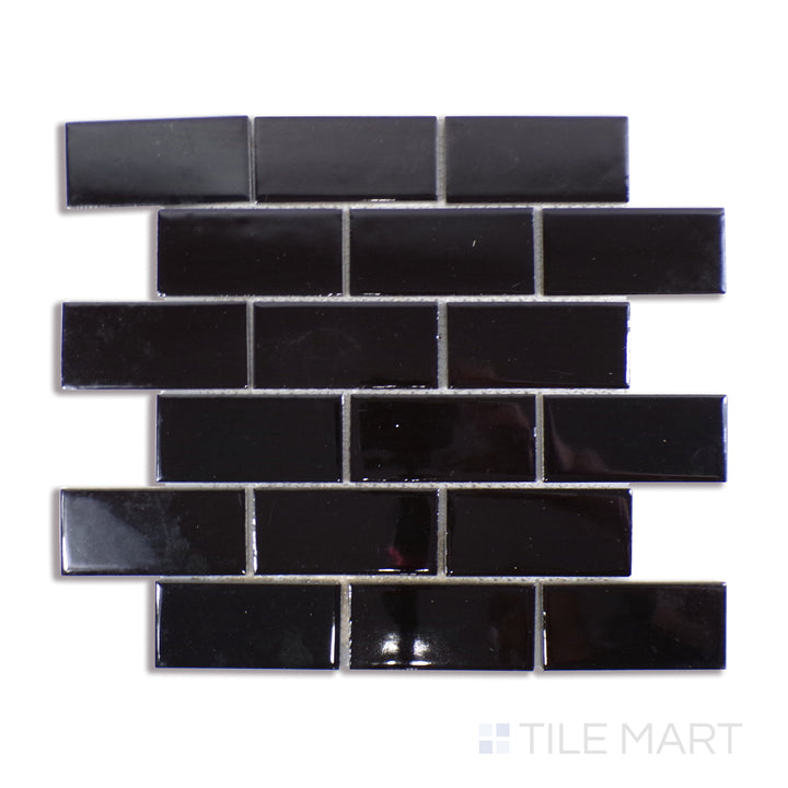 Angled shot of BLACK GLOSSY 2X4 PORCELAIN MOSAIC with a GLOSSY finish, displaying the fine craftsmanship and layered design from a different angle.