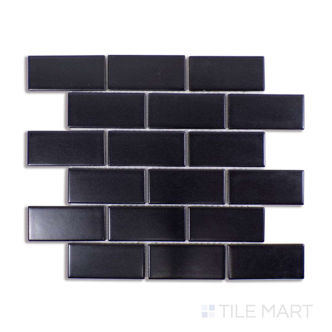 Angled shot of BLACK MATTE 2X4X PORCELAIN MOSAIC with a MATTE finish, highlighting the intricate details and elegant finish from a unique perspective.