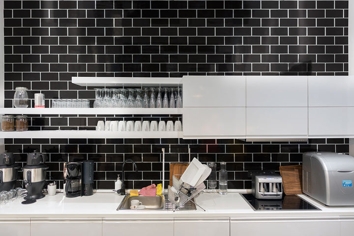 Showcasing the versatile design of BLACK MATTE 2X4X PORCELAIN MOSAIC with a MATTE finish, enhancing the minimalist design with its sleek appearance.