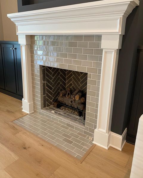 Highlighting the elegance of GRAY GLOSSY 3X6 PORCELAIN TILE with a GLOSSY finish, enhancing the minimalist design with its sleek appearance.