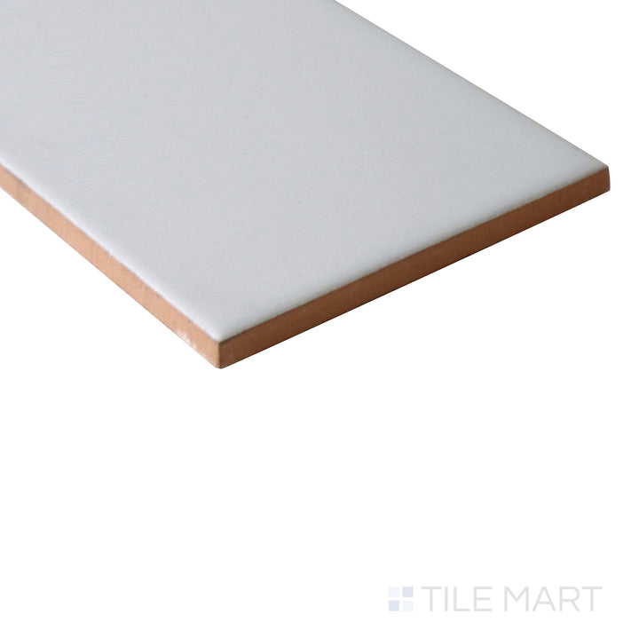 Angled shot of GRAY GLOSSY 4X16 PORCELAIN TILE with a GLOSSY finish, revealing the depth of the product with a skewed visual perspective.