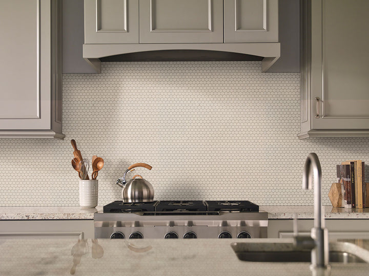 Bringing focus to the sophisticated look of ALMOND GLOSSY PENNY ROUND MOSAIC PORCELAIN MOSAIC with a GLOSSY finish, blending effortlessly with the surrounding modern elements.