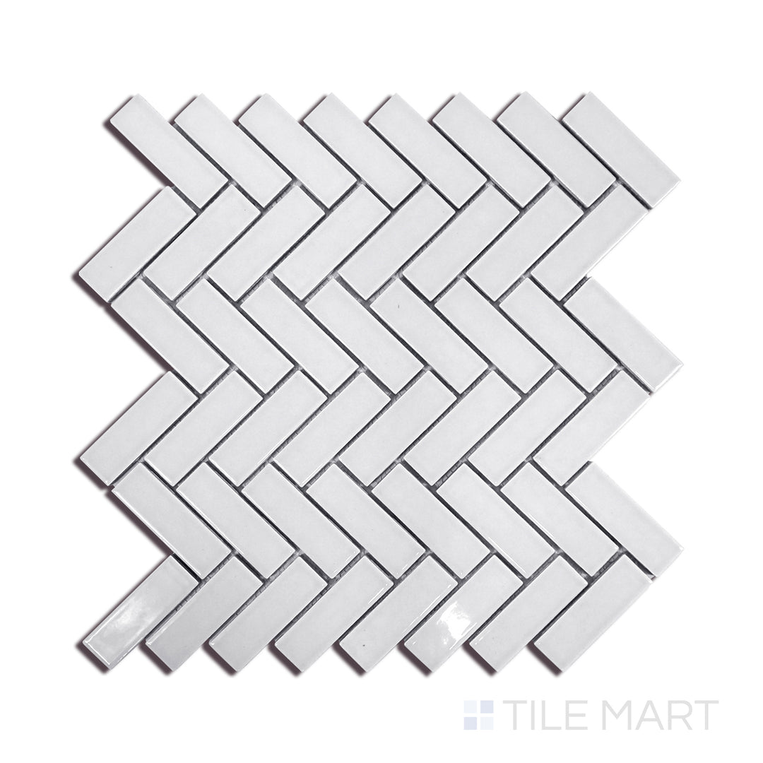 Angled shot of GRAY GLOSSY HERRINGBONE 6MM PORCELAIN MOSAIC with a GLOSSY finish, displaying the fine craftsmanship and layered design from a different angle.