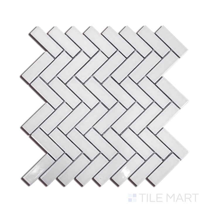 Angled shot of GRAY GLOSSY HERRINGBONE 6MM PORCELAIN MOSAIC with a GLOSSY finish, displaying the fine craftsmanship and layered design from a different angle.