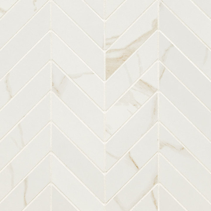 Top-down view of EDEN CALACATTA CHEVRON 12X15 MOSAIC in PORCELAIN MOSAIC with a MATTE finish, presenting the smooth texture and color richness of CALACATTA.