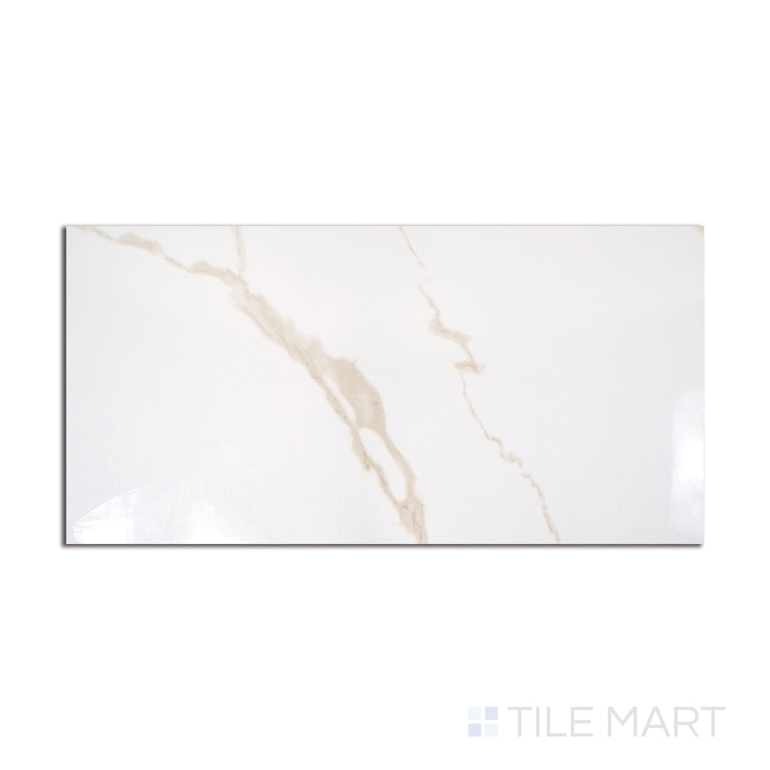 Angled shot of EDEN CALACATTA 12X24 POLISHED PORCELAIN TILE with a POLISHED finish, highlighting the intricate details and elegant finish from a unique perspective.