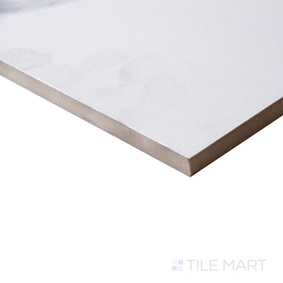 Corner shot of EDEN STATUARY 12X24 POLISHED PORCELAIN TILE with a POLISHED finish, capturing the thickness and material depth from an angled corner perspective.