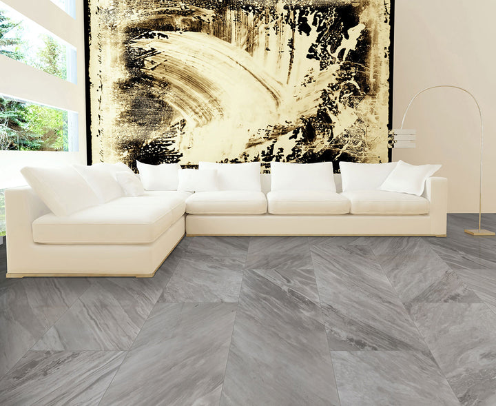 A refined and polished porcelain tile, Eden Bardiglio 24X48 Polished Porcelain showcases deep gray tones with flowing veining in a high-gloss surface.
