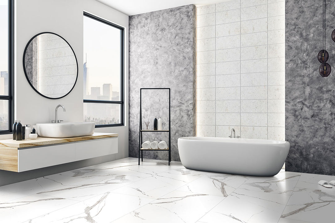 A luxurious and polished porcelain tile, Eden Statuary 24X48 Polished Porcelain features a bright white surface with intricate gray veining.