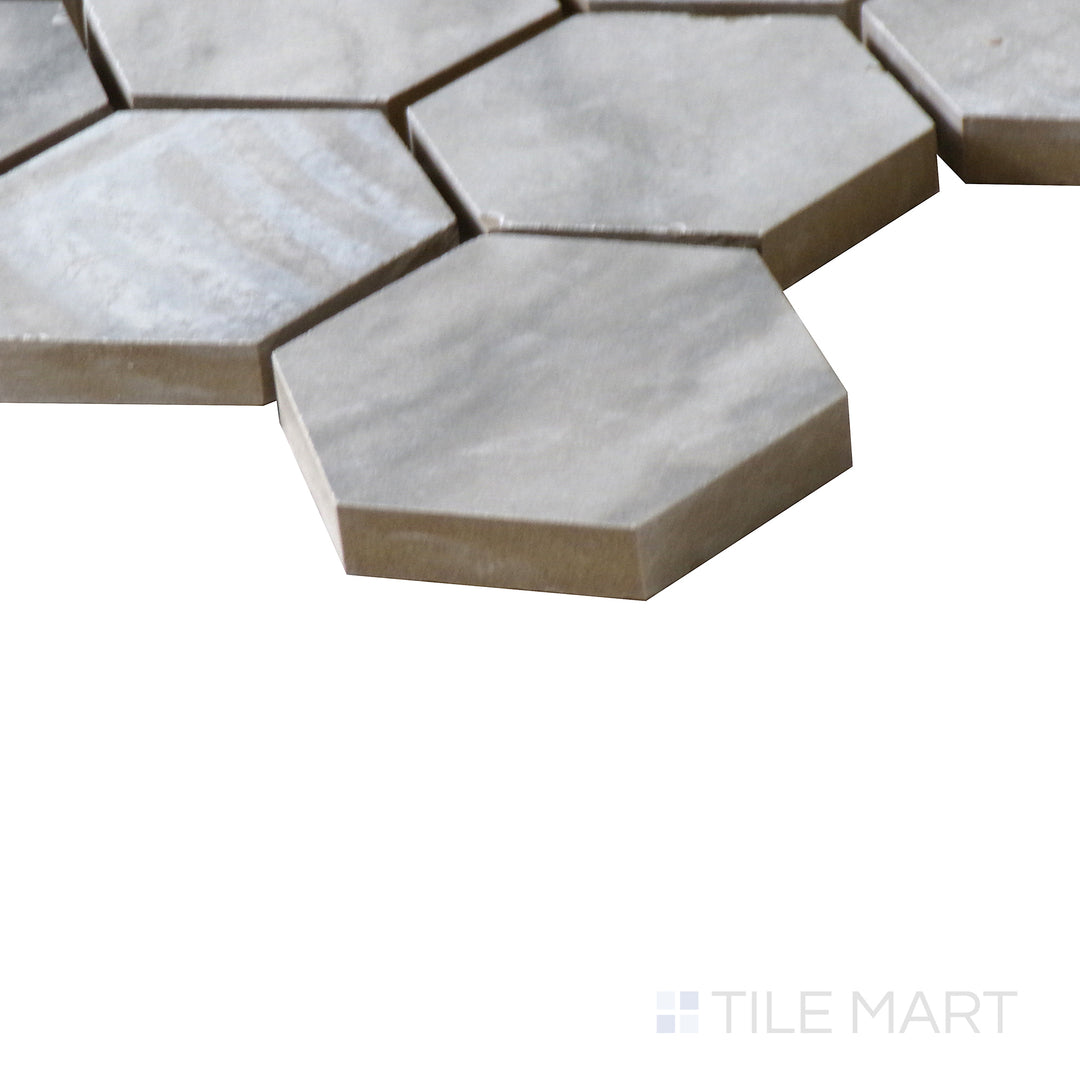Corner shot of EDEN BARDIGLIO 2XX2 HEXAGON MATTE PORCELAIN MOSAIC with a MATTE finish, demonstrating the sturdy material and its subtle layering at the corner.