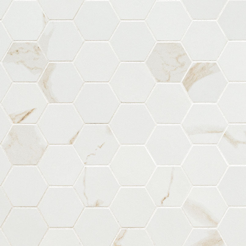 Top-down view of EDEN CALCATTA 2X2 HEXAGON MATTE in PORCELAIN MOSAIC with a MATTE finish, emphasizing its surface details and CALACATTA hues.