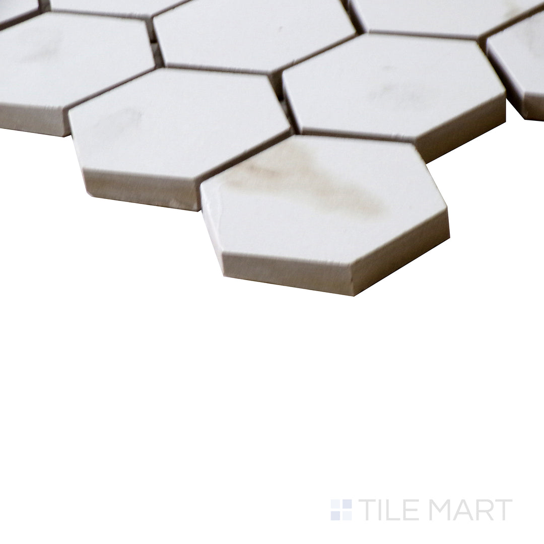 Corner shot of EDEN CALCATTA 2X2 HEXAGON MATTE PORCELAIN MOSAIC with a MATTE finish, offering a close-up look at the product's durability and material thickness at the corner.