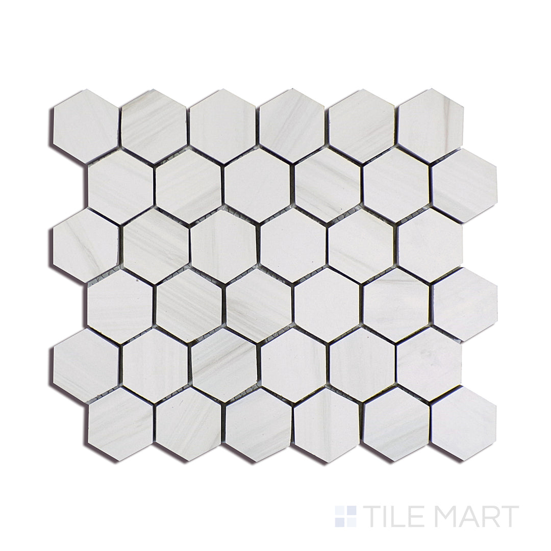 Angled shot of EDEN DOLOMITE 2X2 HEXAGON PORCELAIN MOSAIC with a MATTE finish, offering a detailed look at the material's finish with a tilted viewpoint.