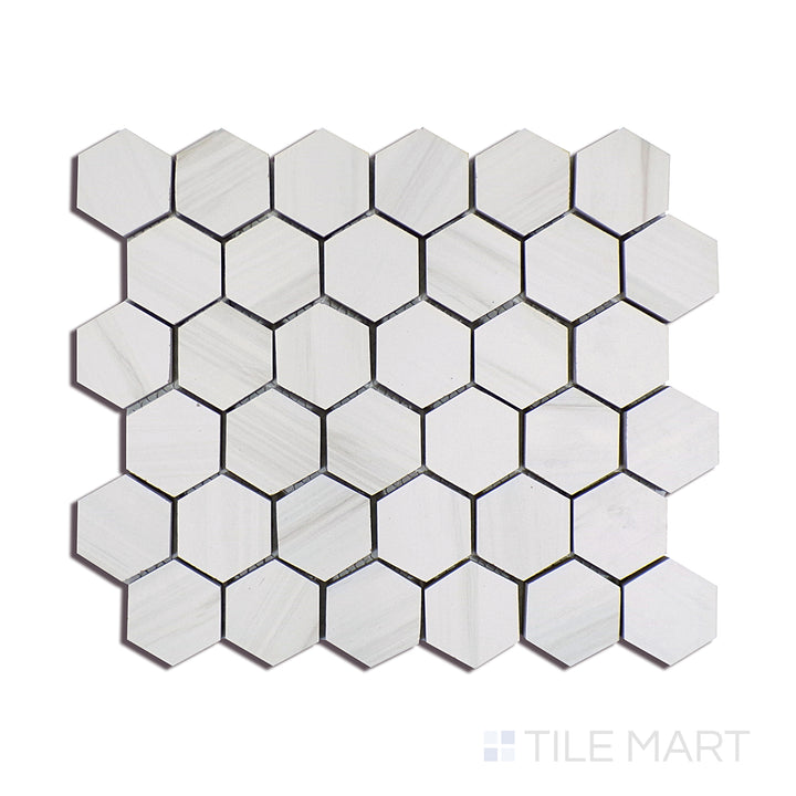 Angled shot of EDEN DOLOMITE 2X2 HEXAGON PORCELAIN MOSAIC with a MATTE finish, offering a detailed look at the material's finish with a tilted viewpoint.