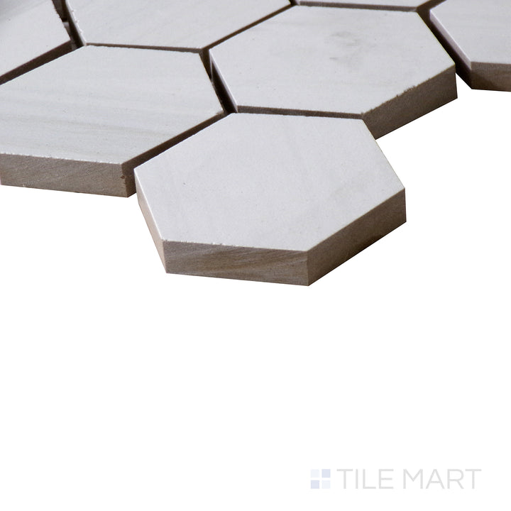 Corner shot of EDEN DOLOMITE 2X2 HEXAGON PORCELAIN MOSAIC with a MATTE finish, showing the robust material and finely finished edge through a focused corner view.