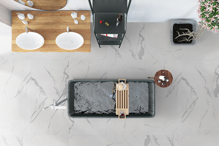 A large-format polished porcelain tile, Eden Statuary 32X32 Polished Porcelain enhances any space with its bright white tones and detailed gray veining.