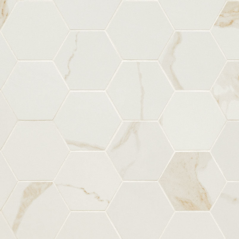 Top-down view of EDEN CALCATTA 3X3 HEXAGON MATTE in PORCELAIN MOSAIC with a MATTE finish, presenting the smooth texture and color richness of CALACATTA.