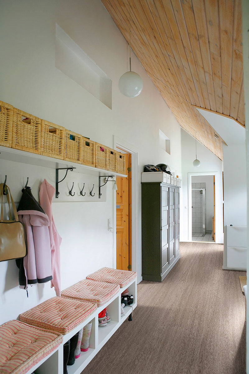 Room interior featuring Glenridge Bleached Elm 6X48 Low Gloss Luxury Vinyl Plank on the floor.