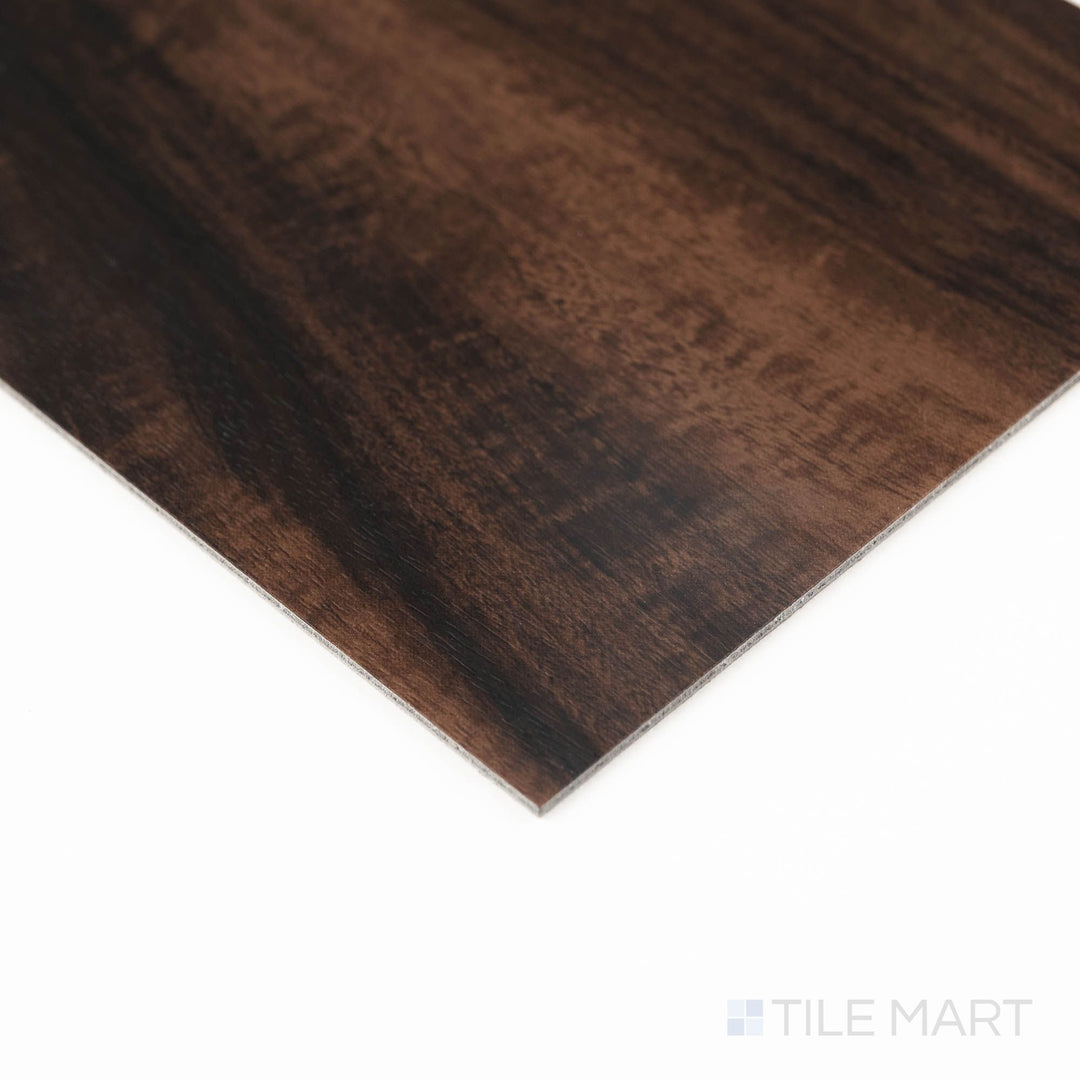 Corner perspective of Glenridge Burnished Acacia 6X48 Low Gloss Luxury Vinyl Plank, highlighting grain patterns and beveled edges.