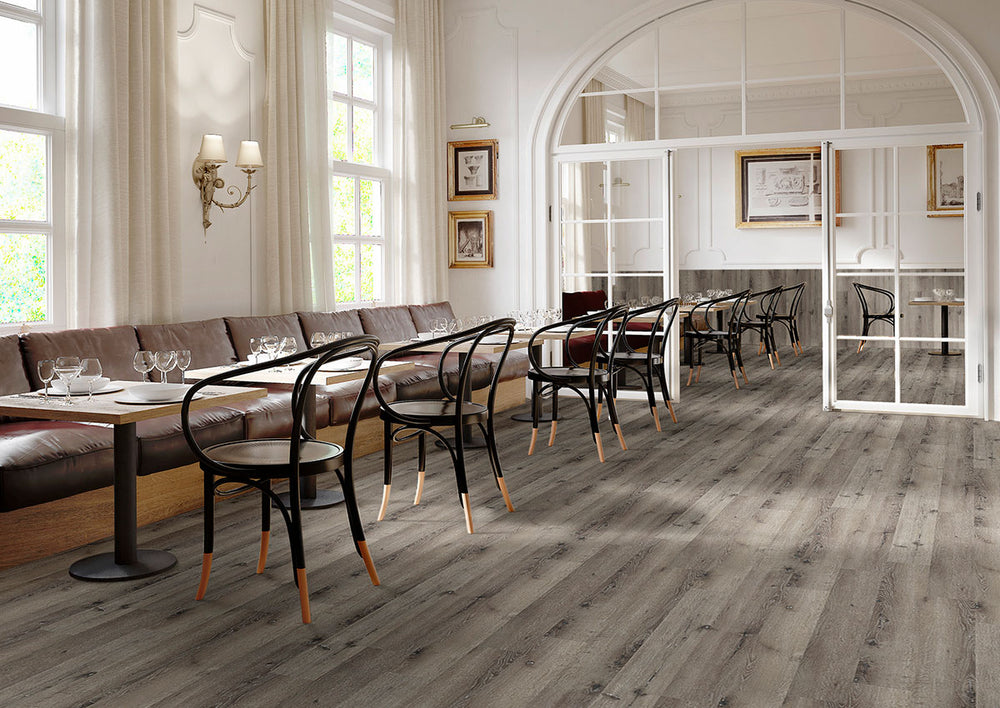 Interior room with Glenridge Charcoal Oak 6X48 Low Gloss Luxury Vinyl Plank flooring.