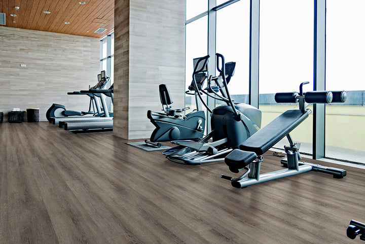 Modern setting with Glenridge Charcoal Oak 6X48 flooring, offering a bold and dramatic foundation.