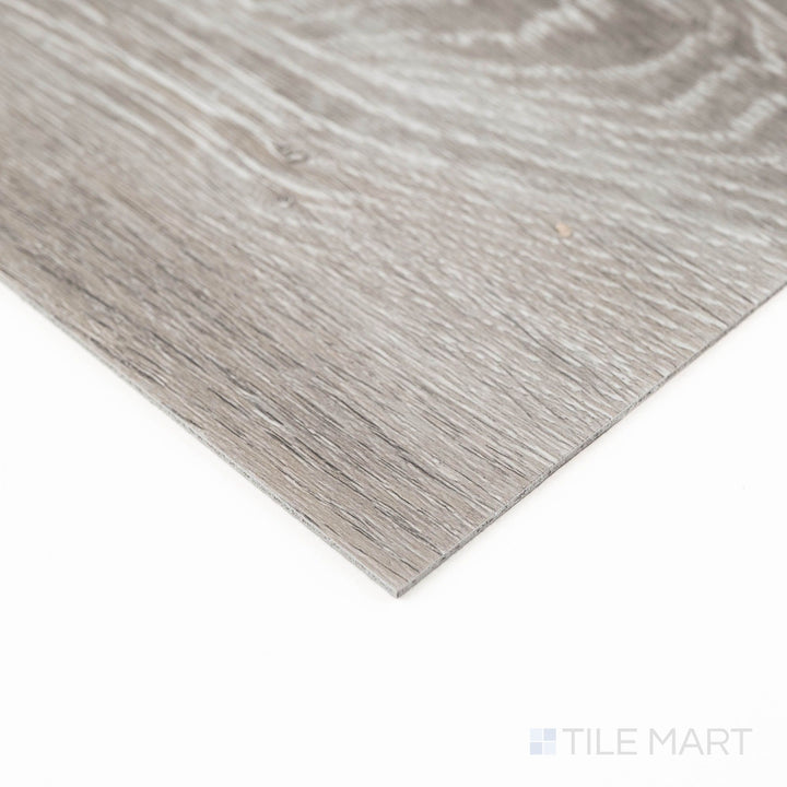 Product corner shot of Glenridge Elmwood Ash 6X48 Low Gloss Luxury Vinyl Plank, emphasizing realistic wood grain and matte finish.
