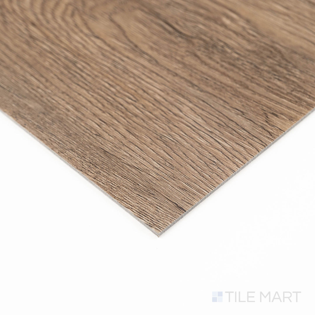 Glenridge Saddle Oak 6X48 Low Gloss Luxury Vinyl Plank seen from a corner angle, showing warm tones and natural wood detailing.