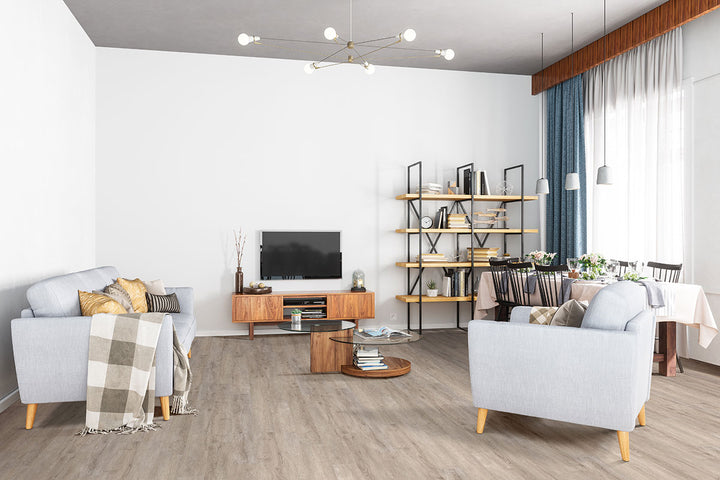 Contemporary space featuring Glenridge Twilight Oak 6x48 low gloss vinyl plank flooring, highlighting smoky gray-brown tones and authentic oak texture for a refined, modern look.