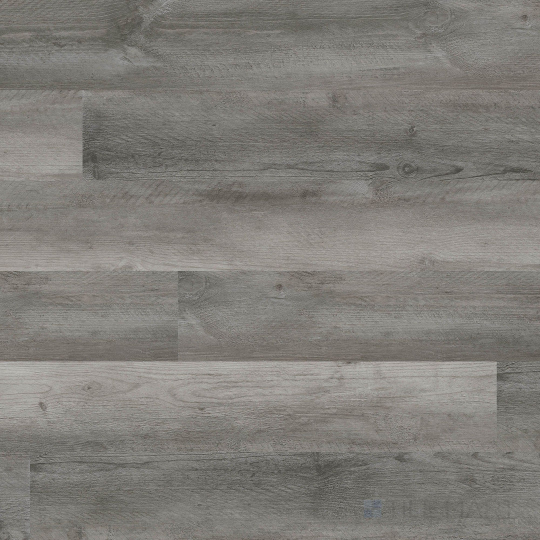 Overview of Glenridge Woodrift Gray 6x48 low gloss luxury vinyl plank – sleek gray wood-look planks with refined grain detail.