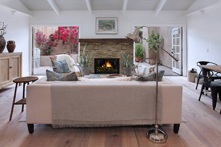 Warm golden hues and rugged textures come together, creating a naturally dynamic look with Rockmount Gold Rush stacked stone panels.