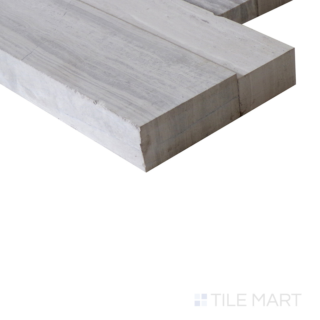 Corner shot of GRAY OAK 3D HONED 6x24 PANEL  MARBLE PANEL with a HONED finish, highlighting the precision of the product's edge and the substantial thickness.