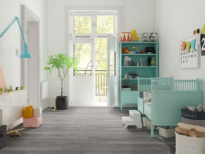 Comfortable environment accented by Katavia Elmwood Ash 6X48 flooring, blending neutral tones with texture.