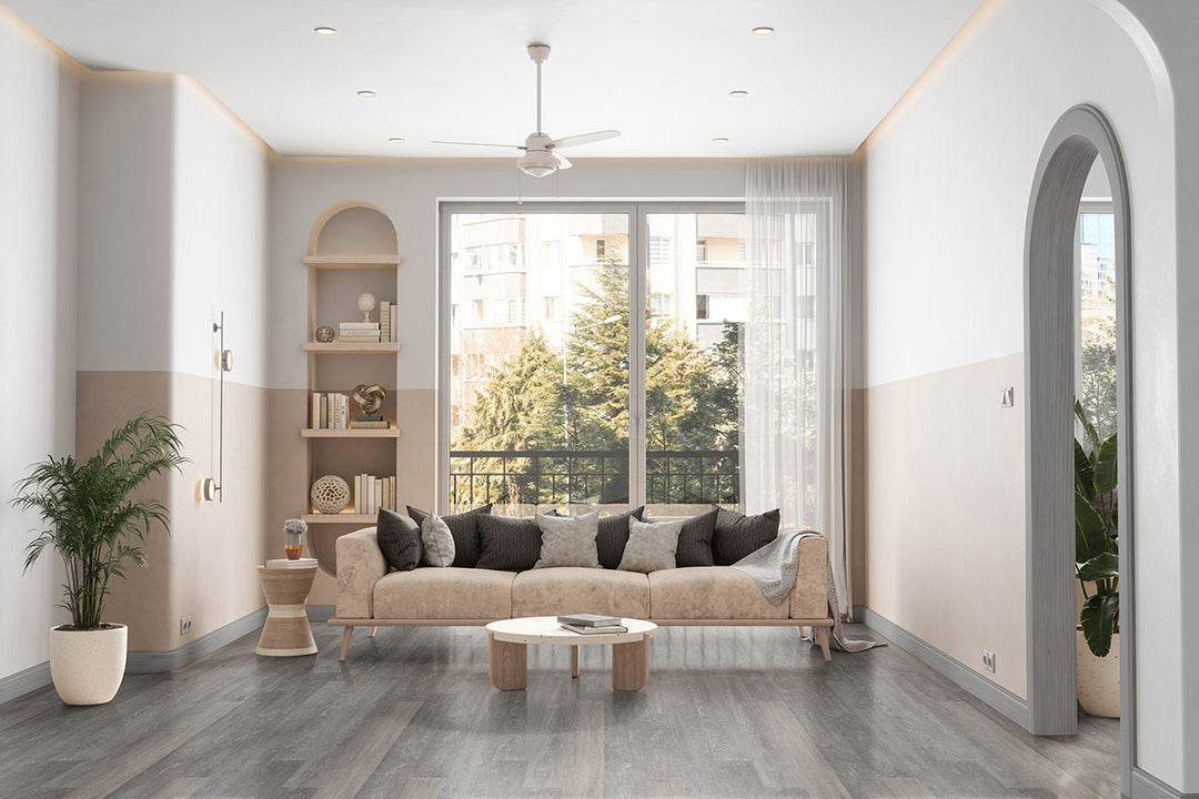 Transitional living space with Katavia Elmwood Ash 6x48 low gloss vinyl plank flooring, showcasing neutral gray-brown tones and refined wood textures for a balanced, versatile design.