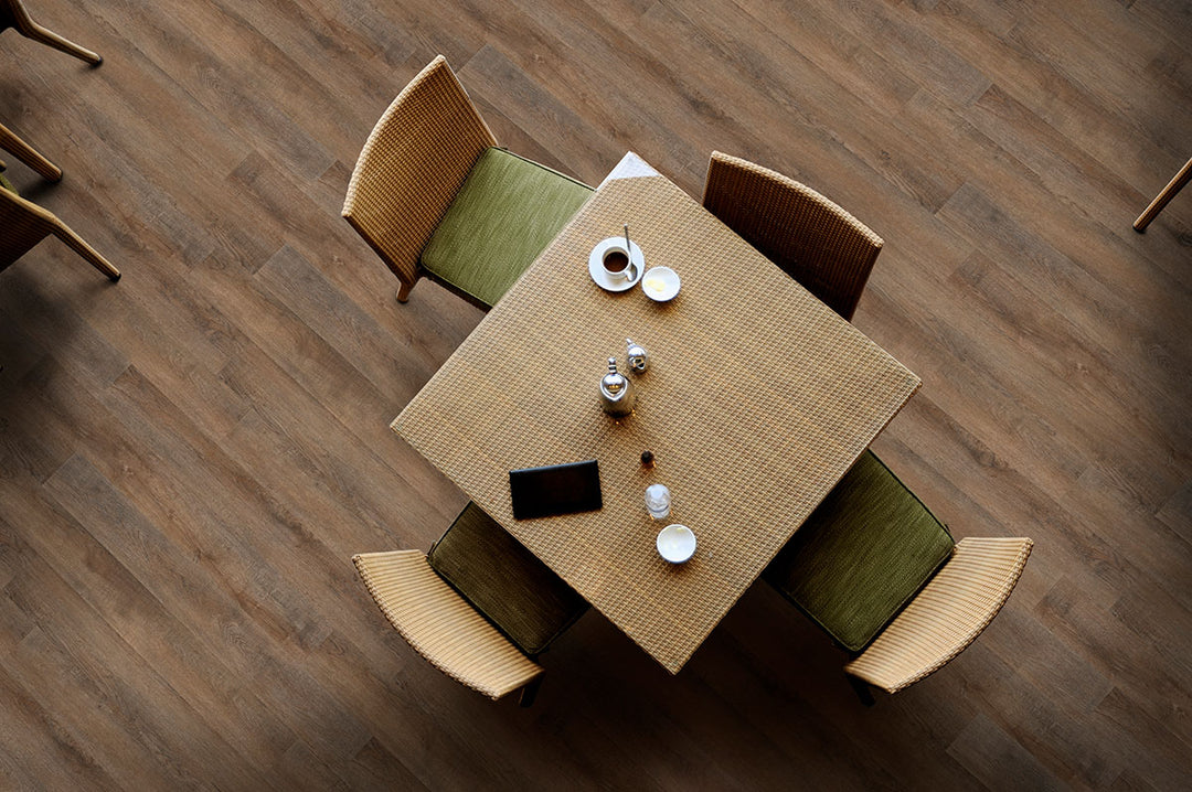 Charming rustic setup with Katavia Reclaimed Oak 6X48 flooring, offering a well-worn, authentic look.