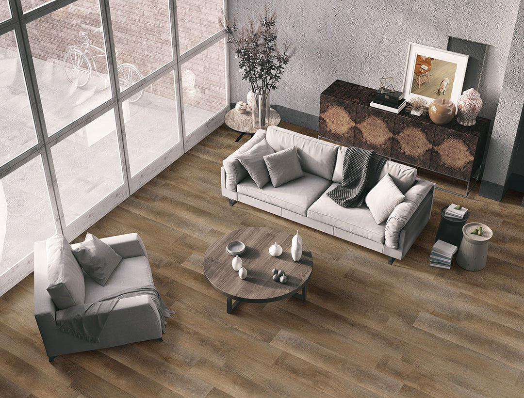 Rustic-meets-industrial setting enhanced by Katavia Reclaimed Oak 6x48 luxury vinyl planks, featuring weathered textures and warm, lived-in tones for a cozy vintage vibe.