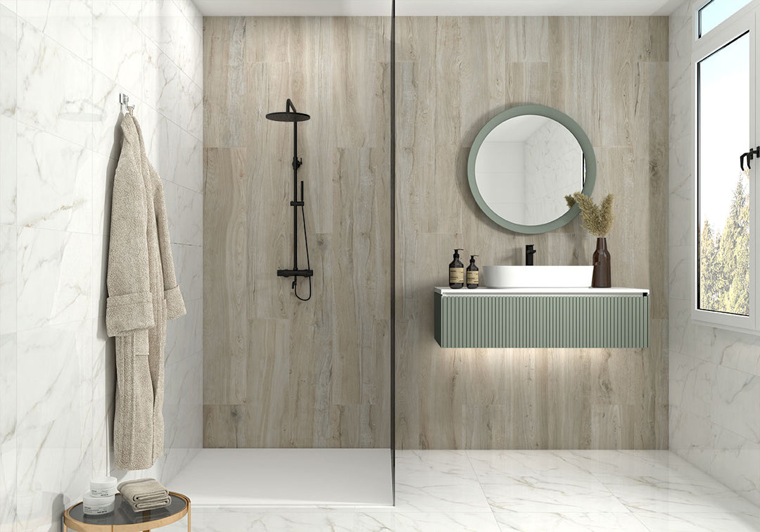 Subtle veining and a soft matte finish create a sophisticated ambiance with Kaya Calacatta Lucca 12x24 porcelain tiles.