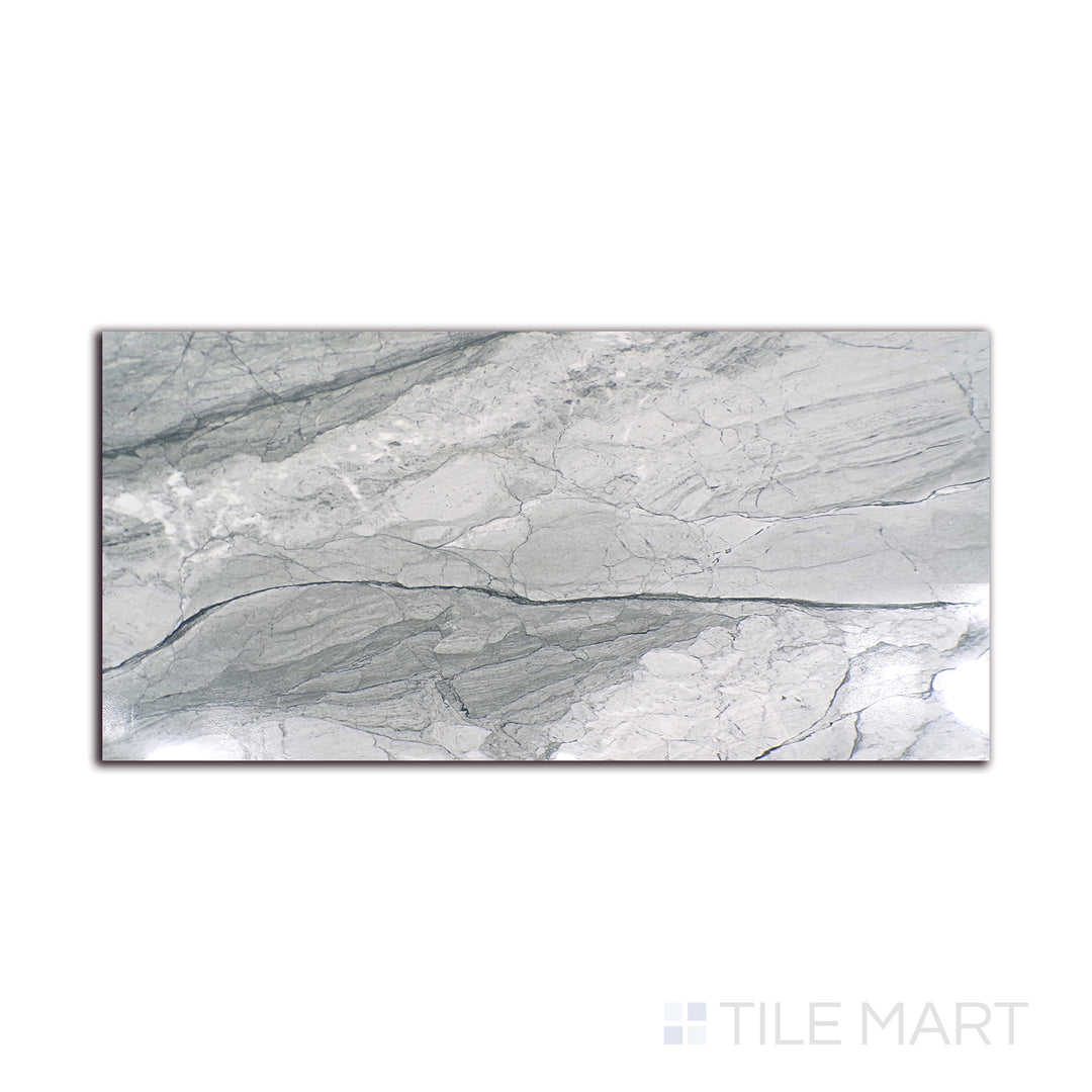 Angled shot of KAYA ONDA GRAY 12X24 POLISHED PORCELAIN TILE with a POLISHED finish, highlighting the intricate details and elegant finish from a unique perspective.