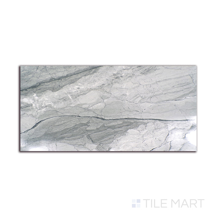 Angled shot of KAYA ONDA GRAY 12X24 POLISHED PORCELAIN TILE with a POLISHED finish, highlighting the intricate details and elegant finish from a unique perspective.