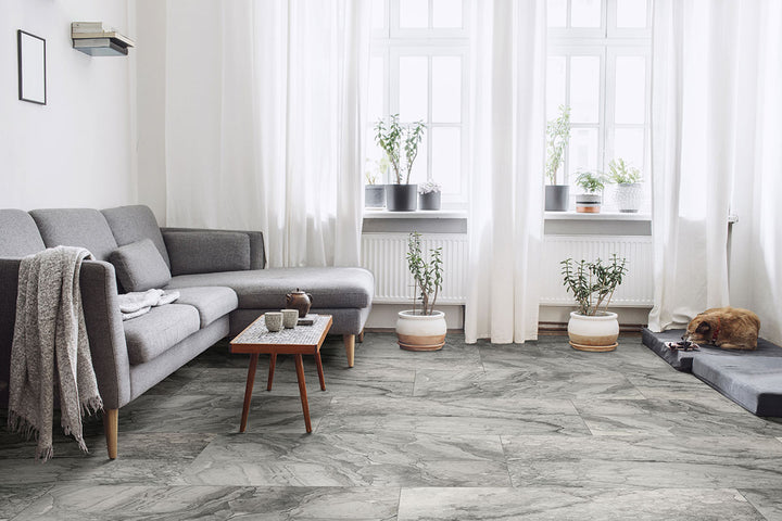 With a polished sheen, Kaya Onda Gray 12x24 porcelain tiles bring a contemporary feel with soft gray waves and natural depth.