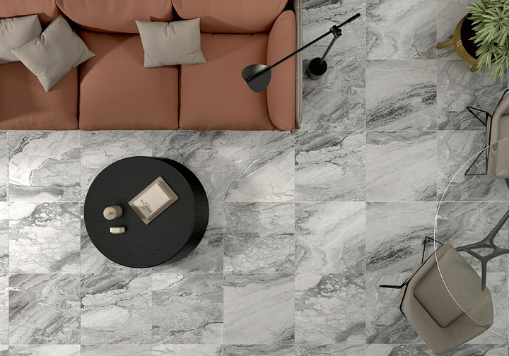 Emphasizing the beauty of KAYA ONDA GRAY 24X24 MATTE PORCELAIN TILE with a MATTE finish, blending effortlessly with the surrounding modern elements.