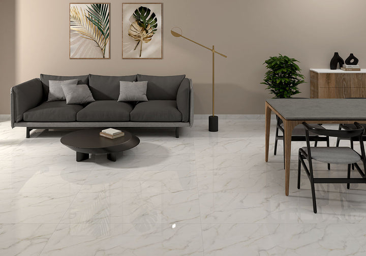 Expansive and sophisticated, Kaya Calacatta Lucca 24x48 matte porcelain tiles showcase soft veining for a natural, seamless look.