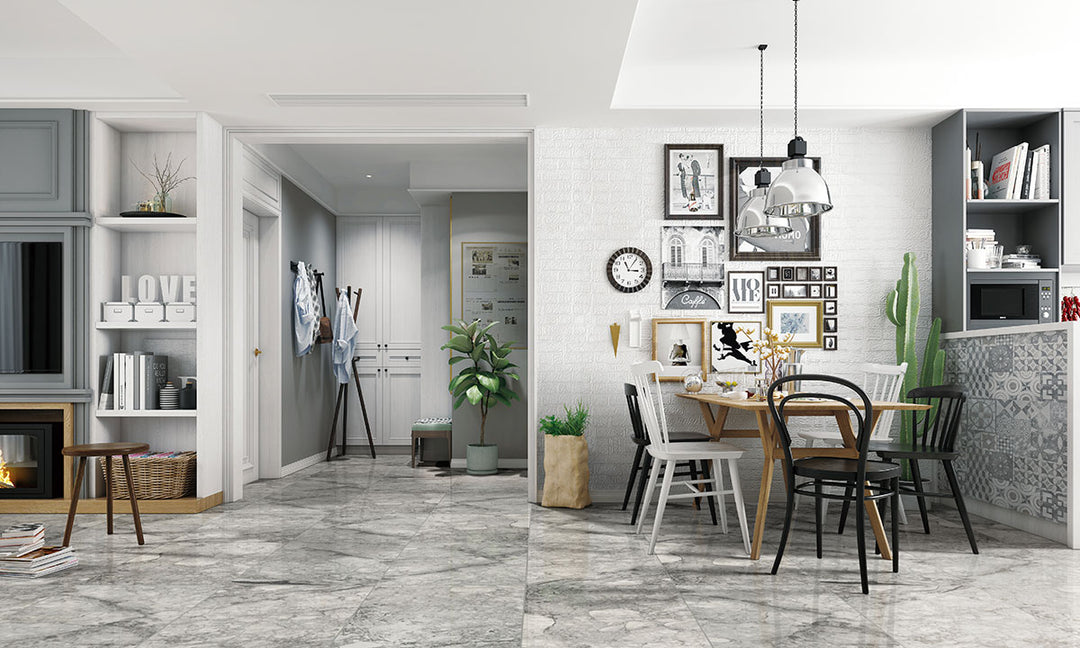 A glossy sheen enhances the cool gray hues and delicate textures, creating a refined and contemporary look with Kaya Onda Gray 24x48 polished porcelain.