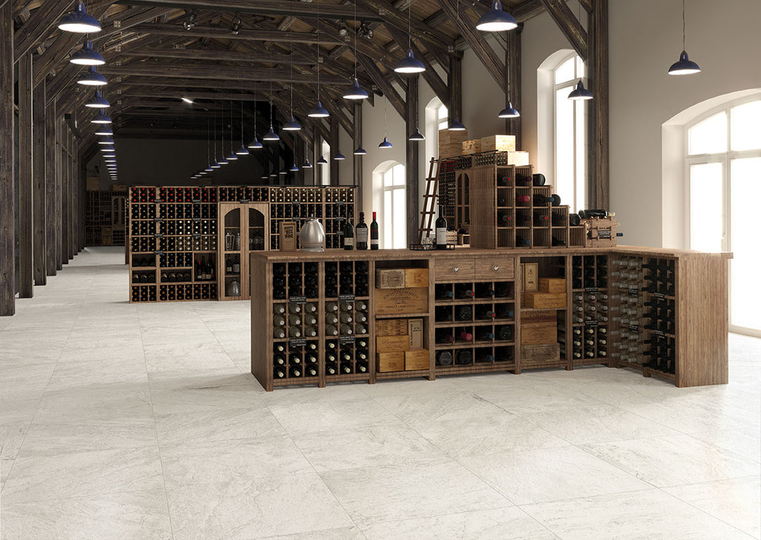 A bright white matte surface with subtle movement and texture brings a clean and modern touch with Legion Quartz White 24x24 matte porcelain.