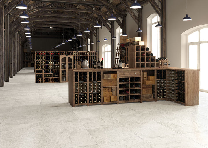 A bright white matte surface with subtle movement and texture brings a clean and modern touch with Legion Quartz White 24x24 matte porcelain.