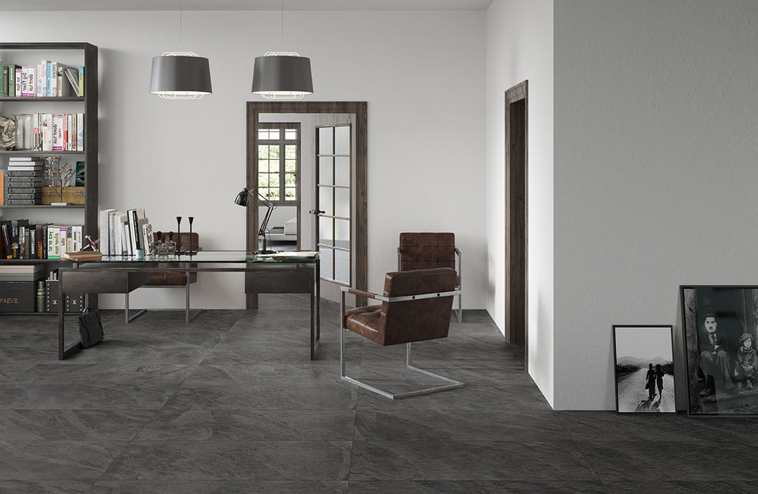 Emphasizing the beauty of LEGIONS MIDNIGHT MONTAGE BLACK 24X48 PORCELAIN TILE with a MATTE finish, enhancing the minimalist design with its sleek appearance.