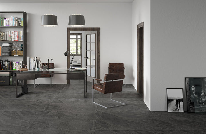 Emphasizing the beauty of LEGIONS MIDNIGHT MONTAGE BLACK 24X48 PORCELAIN TILE with a MATTE finish, enhancing the minimalist design with its sleek appearance.