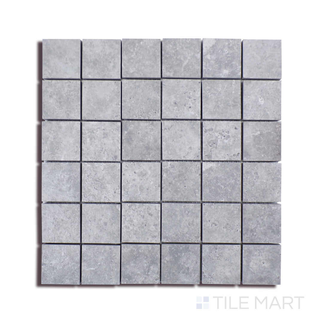 Angled shot of LEGIONS LUNAR SILVER 2X2 MATTE MOSAIC PORCELAIN MOSAIC with a MATTE finish, revealing the depth of the product with a skewed visual perspective.